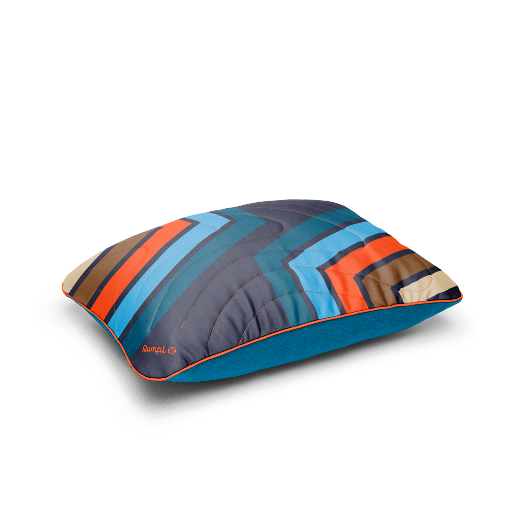 Rumpl The Camp Pillow - Midnight Retro Stripes The Camp Pillow - Midnight Retro Stripes | Rumpl Blankets For Everywhere Camp Pillow