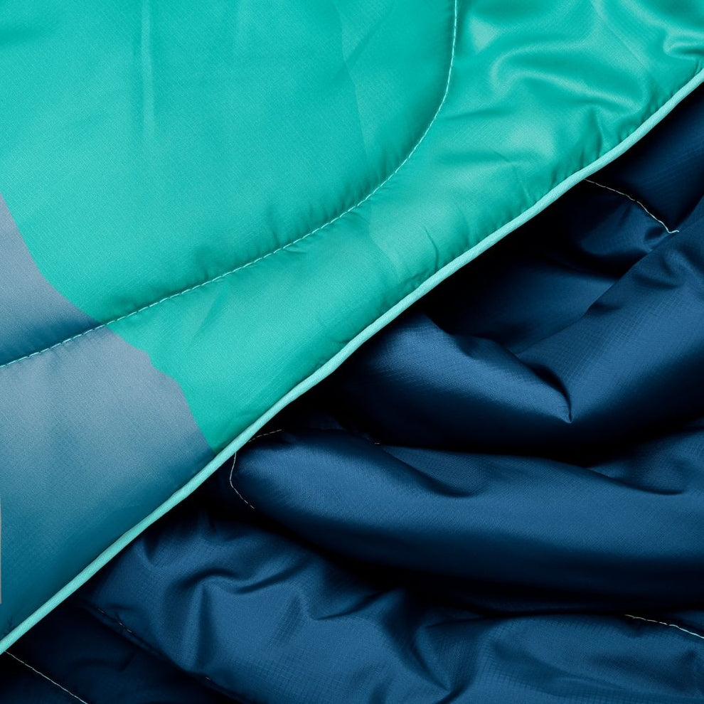 Rumpl Original Puffy Mini Blanket - Seascape Ridge Mountains Original Puffy Mini Blanket - Seascape Ridge Mountains | Rumpl Blankets For Everywhere Printed Original