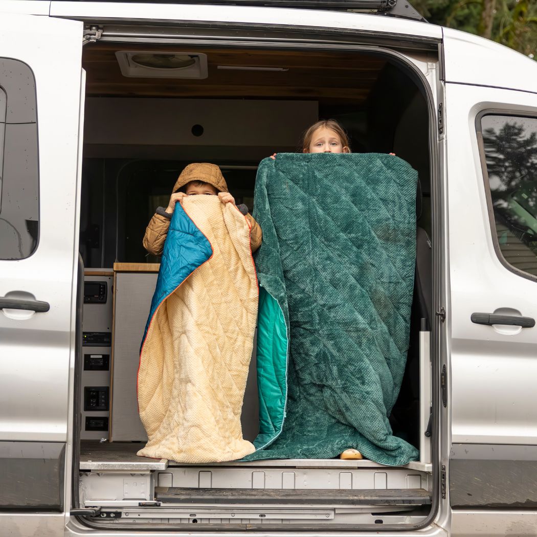 Rumpl Fleece Puffy Mini Blanket - Seascape Cream Fleece Puffy Mini Blanket - Seascape Cream | Rumpl Blankets For Everywhere Solid Fleece Puffy